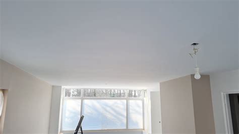Infographic: Berekening van m2 muren en plafonds in een voorbeeldwoning