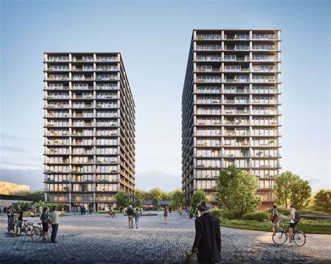 Foto van de vier flatgebouwen langs de Maas na renovatie