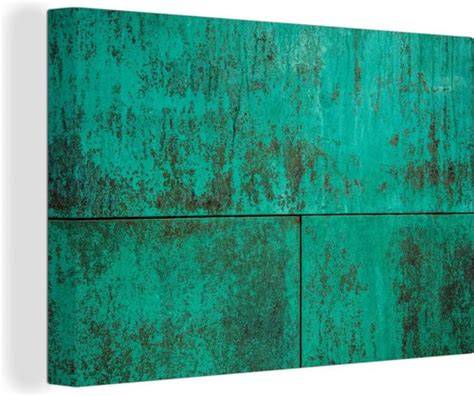 Groene patina op koperoppervlak als gevolg van oxidatie en milieu-invloeden