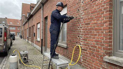 Spouwmuurisolatie: injectie door boorgaten