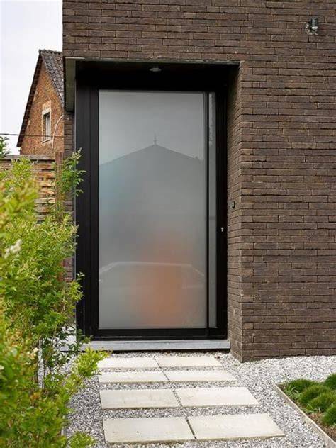 Voorbeeld van gezandstraald glas in een voordeur
