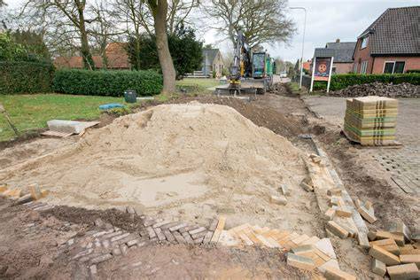 Diagram: Plaatsing van een gat en zandbed voor betonpoer