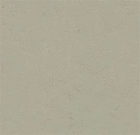 Forbo Marmoleum Concrete: massief marmeren ontwerpen met steen-achtige structuur in neutrale en accentkleuren