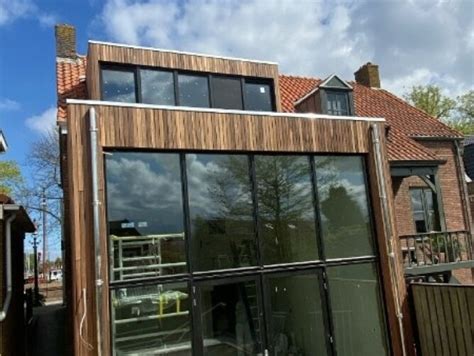 Visualisatie van verschillende stijlen houten aanbouwen