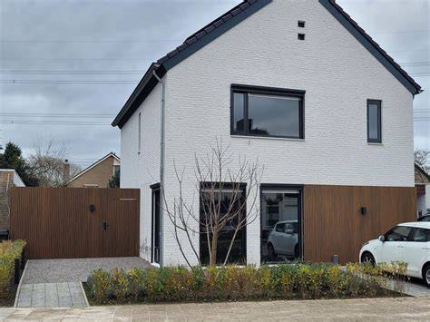 Foto: Voorbeelden van witte gevelbekleding en crepi