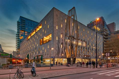 Illustratie van het oorspronkelijke Bijenkorf gebouw van Dudok met de gevelsteen