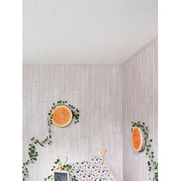 Uitsnede van een OK MDF plafondpaneel met wit generfd design