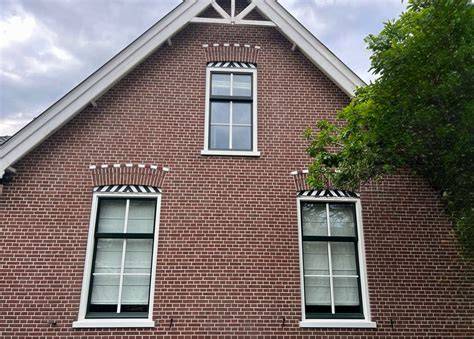 Infographic: Vergelijking houten kozijnprofielen (Nederlands, Amsterdams, Passief) en hun eigenschappen