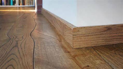 Boekhouding en onderhoudstips voor houten plinten in een indigo loft