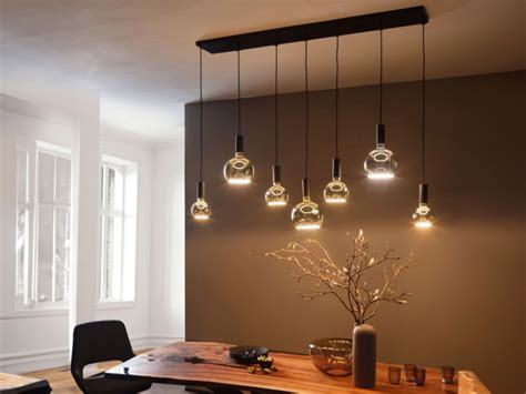 Illustratie van een plafondplaat met meerdere hanglampen aangesloten op één lichtpunt